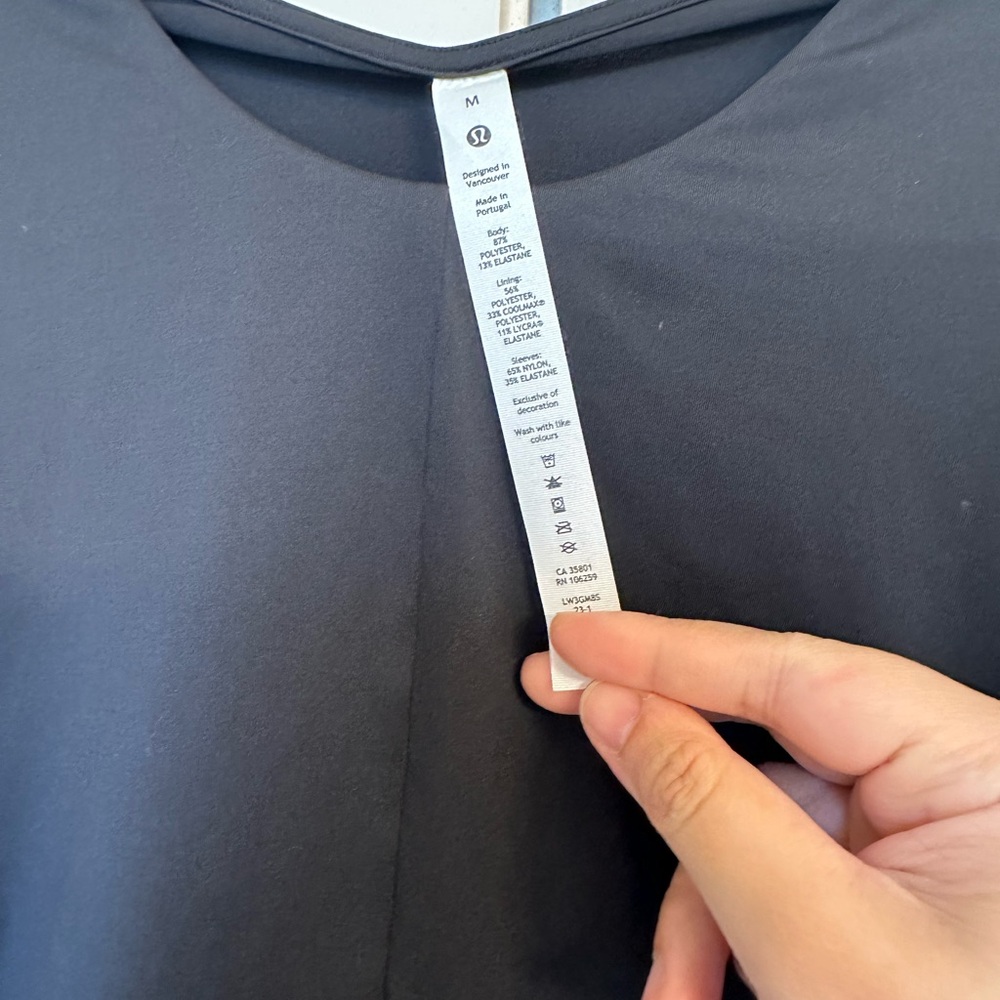 EUC lululemon athletica Black Fitted Crop Long Sleeve Top - Picture 2 of 5